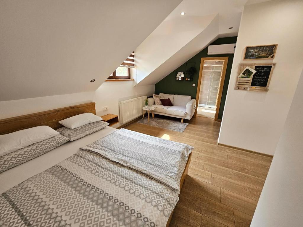 Attic bedroom with double bed and reading nook